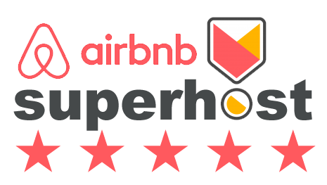 Airbnb Superhost badge with the Airbnb logo, shield, 5 red stars, and 