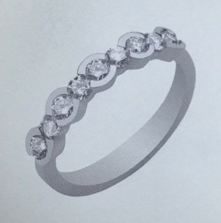 Una fotografía en blanco y negro de un anillo de diamantes