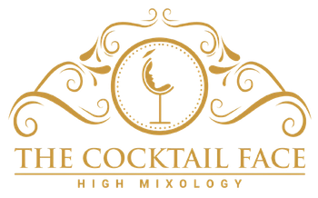 Logotipo dorado: "The Cocktail Face" con diseño de rostro/copa de cóctel y adornos.