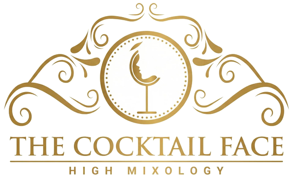 Logotipo dorado: "The Cocktail Face" con dise&ntilde;o de rostro/copa de c&oacute;ctel y adornos.