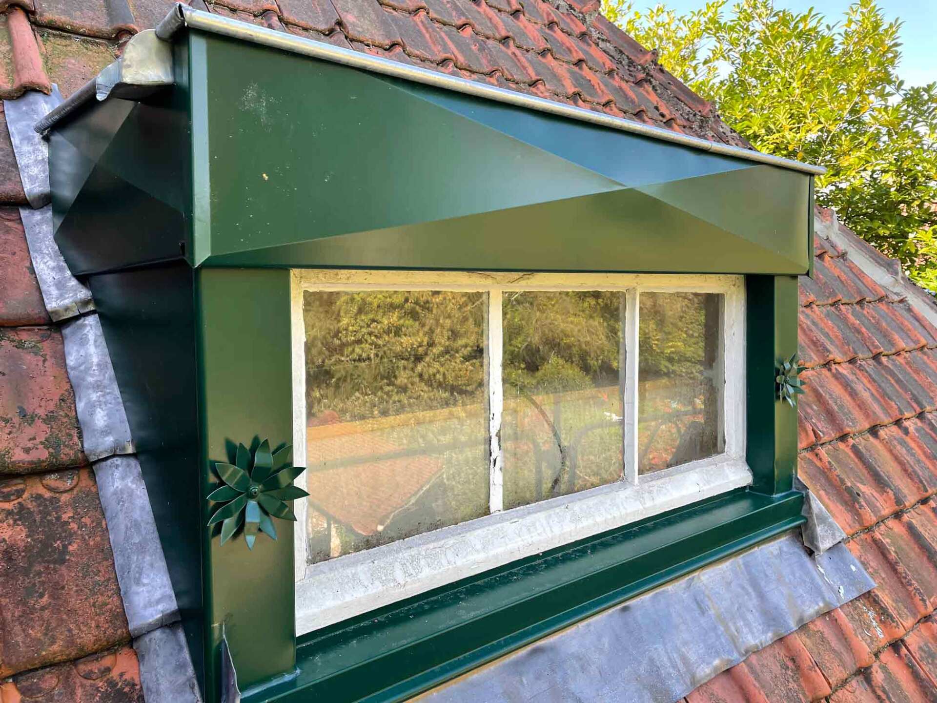 Réfection d'une toiture avec finition sur fenêtre