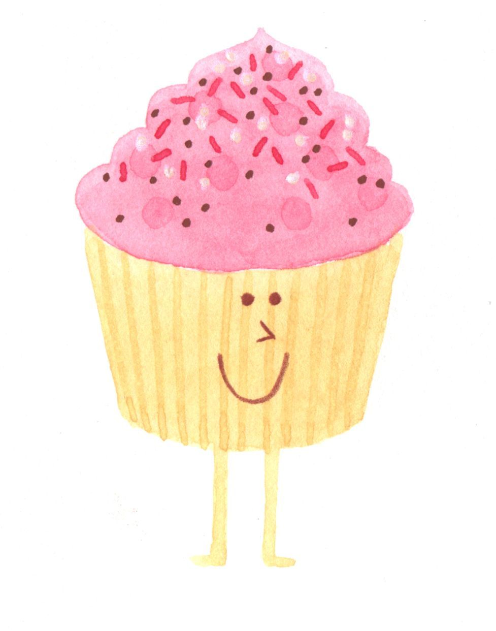 Un cupcake con glaseado rosa y chispas tiene cara y piernas.