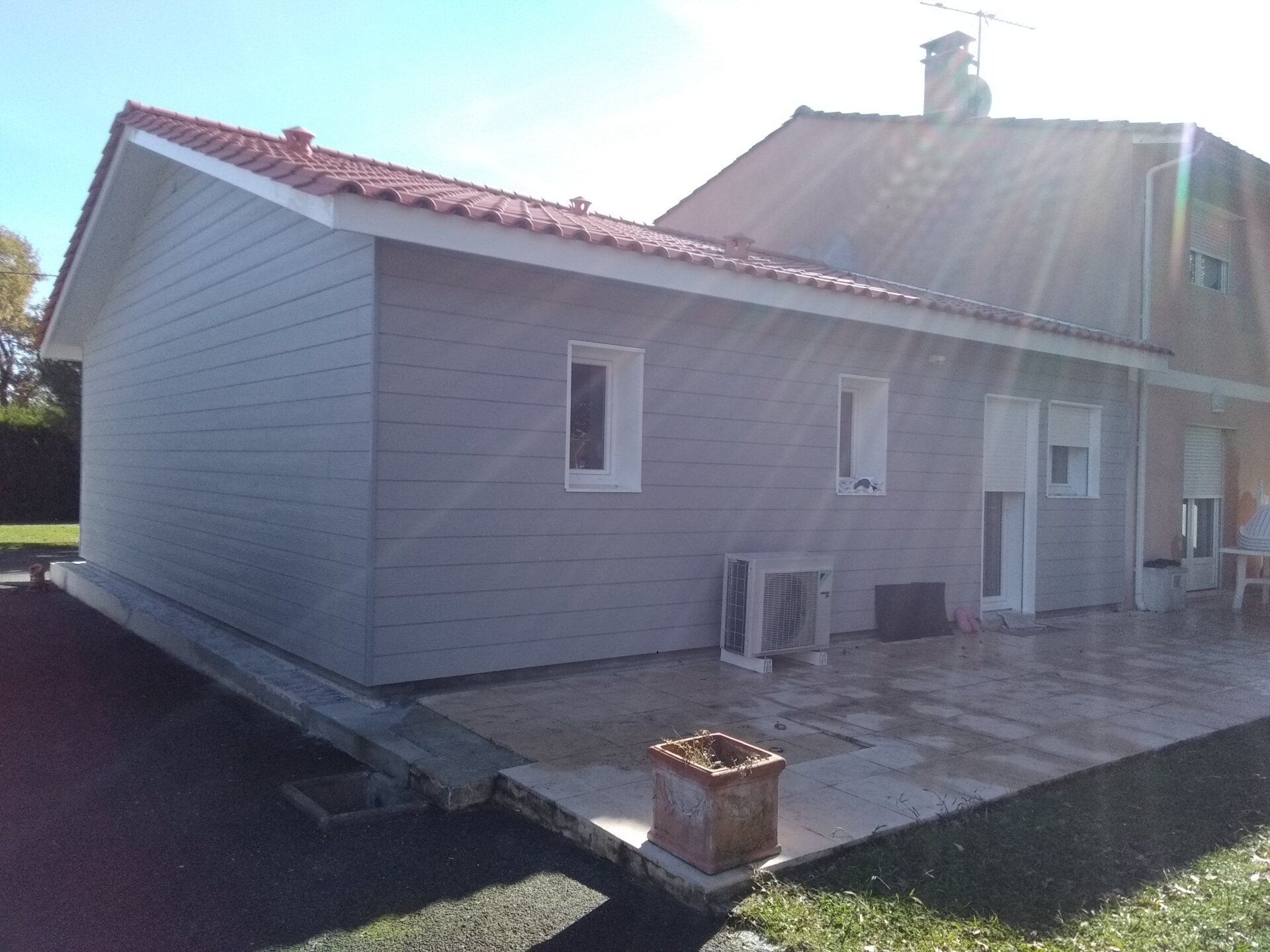 Bardage et toiture en tuiles