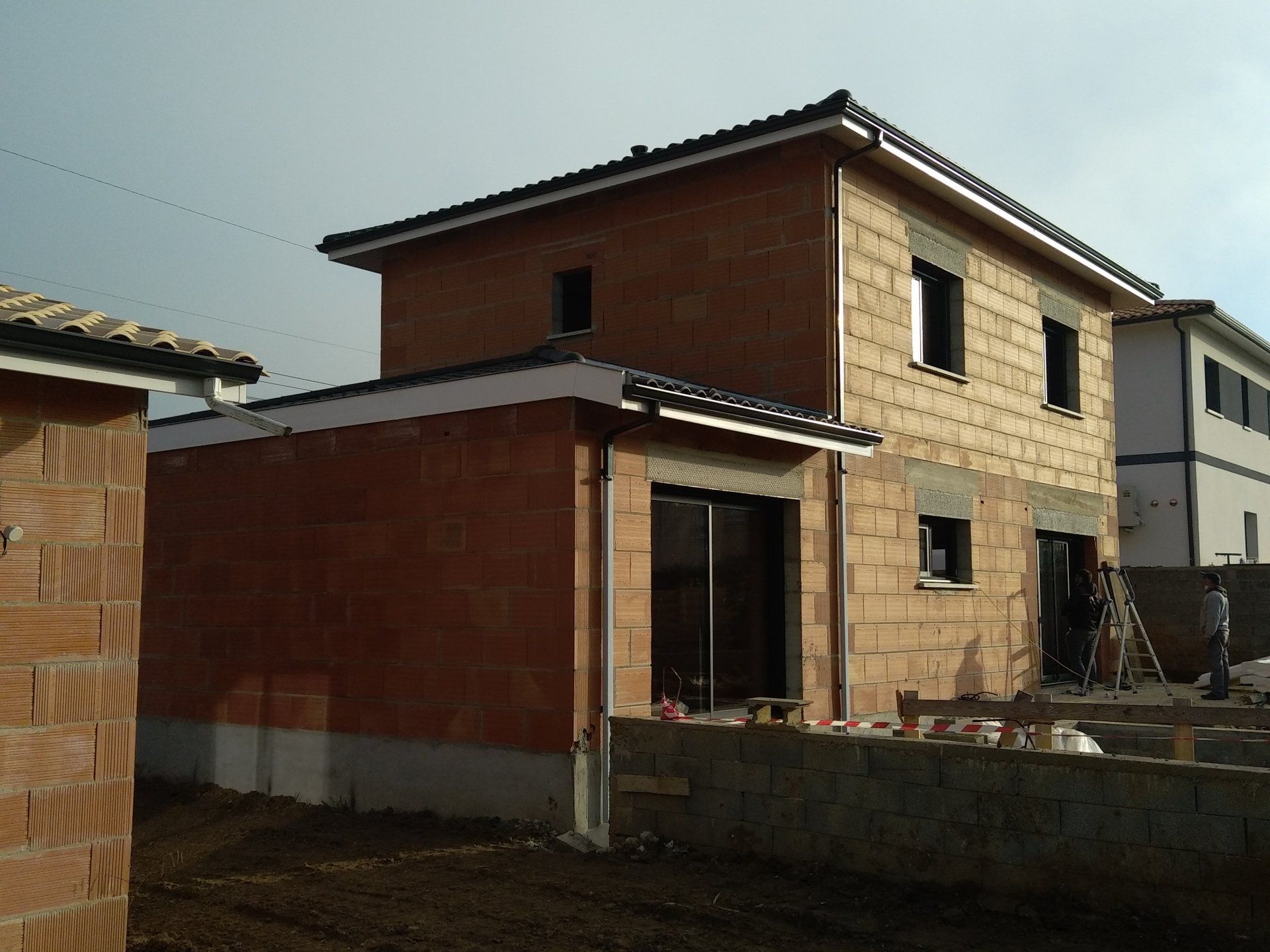 Pose d'une couverture sur maison neuve