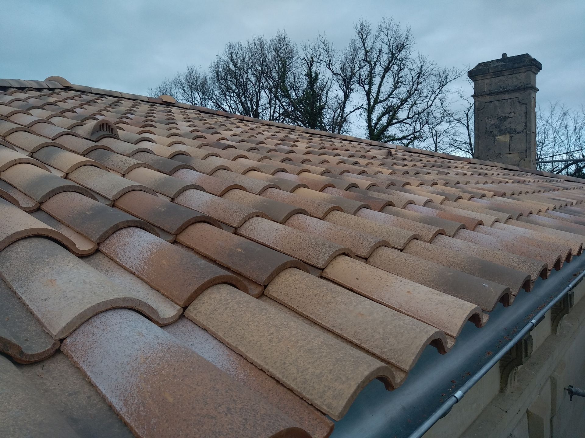 Remplacement de couverture tuiles et zinguerie à ARVEYRES