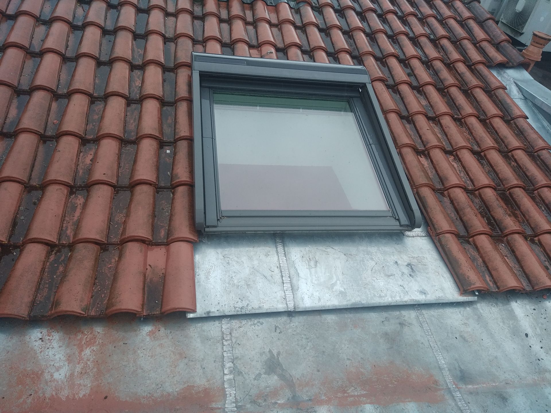 Velux sur une toiture inclinée