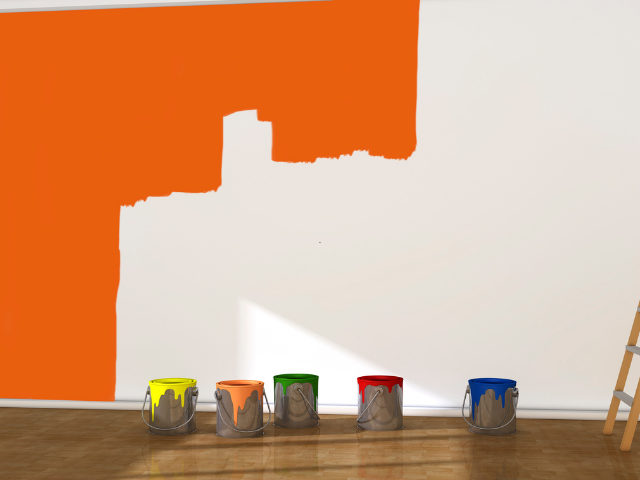 Un mur peint en orange, avec cinq pots de peinture de différentes couleurs en dessous et une échelle à droite.