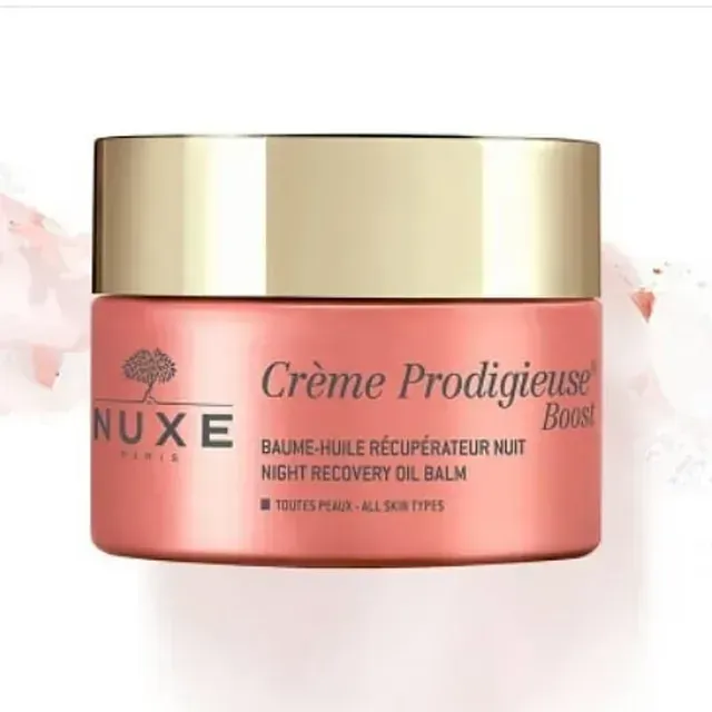 Un frasco de bálsamo de aceite recuperador de noche Nuxe Creme Prodigieuse Boost