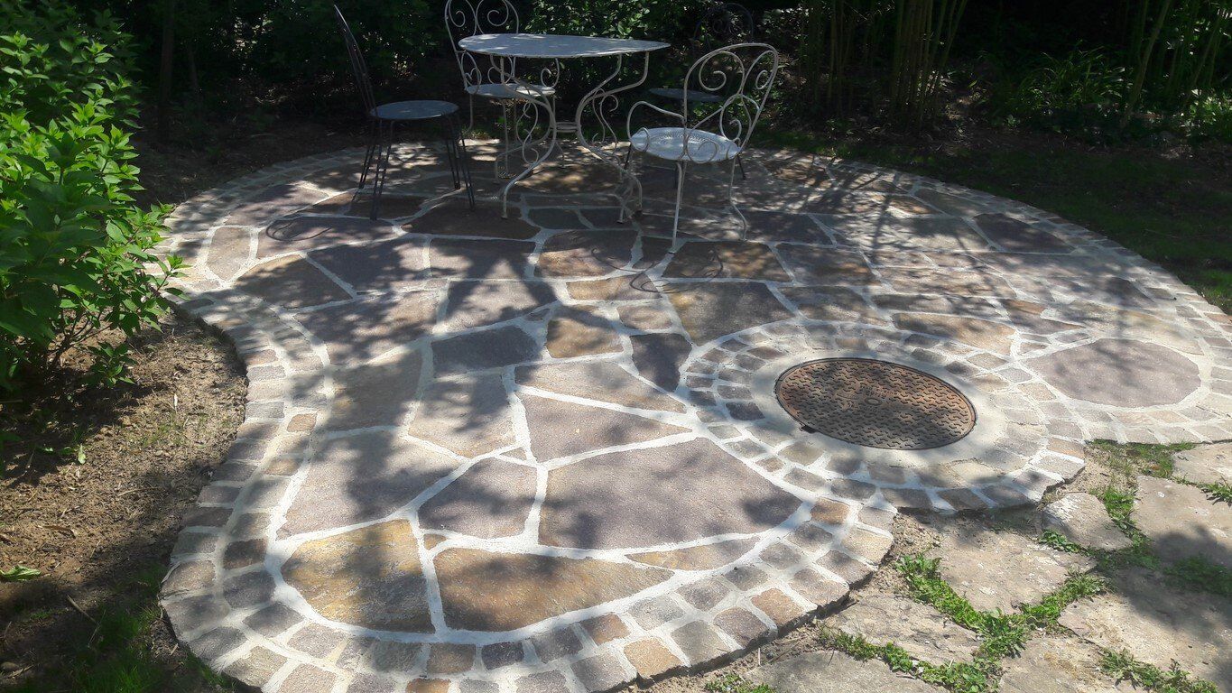 Aménagement d'un espace terrasse en porphyre italien