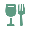 Un tenedor y una copa de vino sobre un fondo blanco.