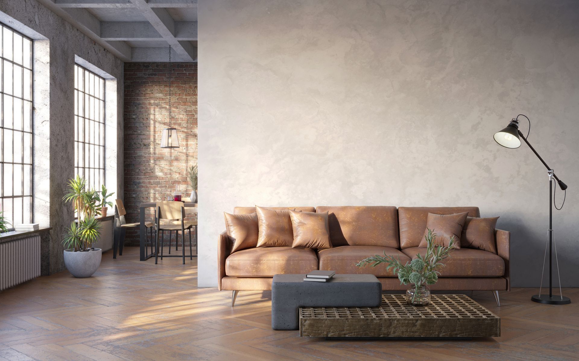 Ein Wohnzimmer mit einer braunen Couch, einem Couchtisch und einer Lampe.