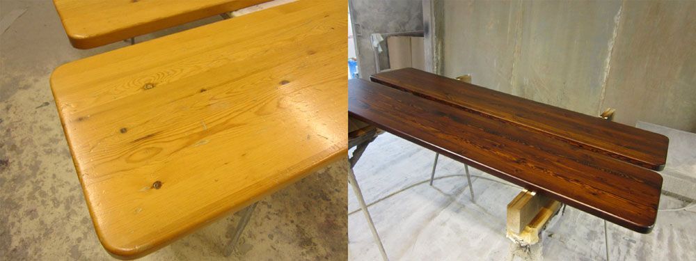 Kaksi puista penkkiä, toinen vaaleankeltainen, toinen tummanruskea, betonilattialla ja työpajassa.