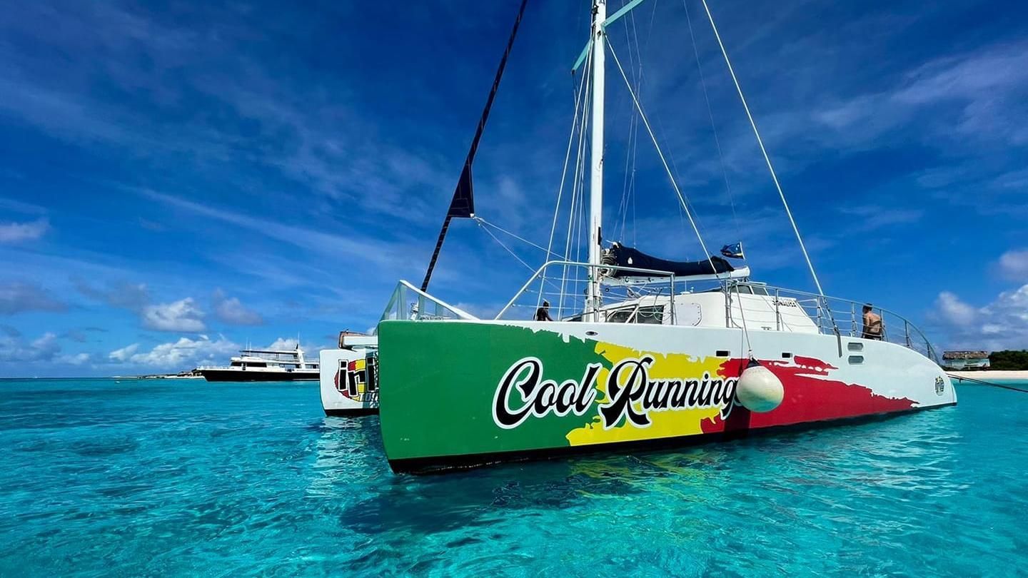 Green and white boat with 