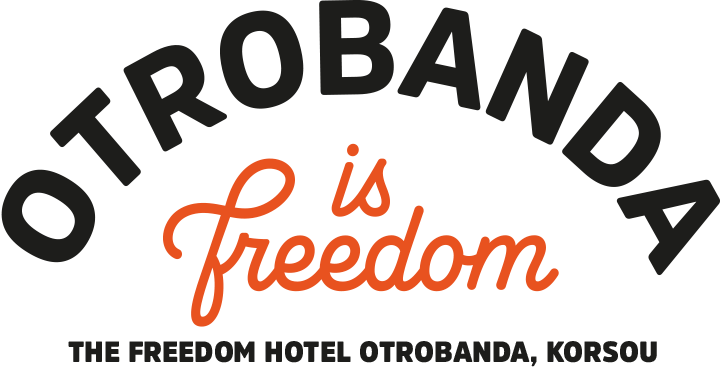 Otrobanda is Freedom logo in black and orange with “The Freedom Hotel Otrobanda, Korsou” text