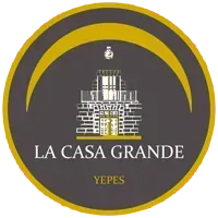 Un logotipo para la casa grande yepes con un edificio de ladrillos en el medio de un círculo.