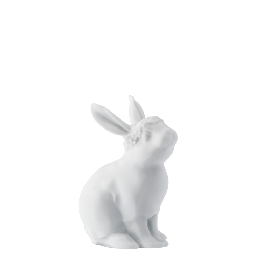 Weiße Porzellan-Hasenstatue in sitzender Position mit aufgestellten Ohren.