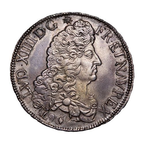 Pièce en argent représentant le profil d'un roi, probablement Louis XIII, tourné vers la droite. Texte sur le pourtour.