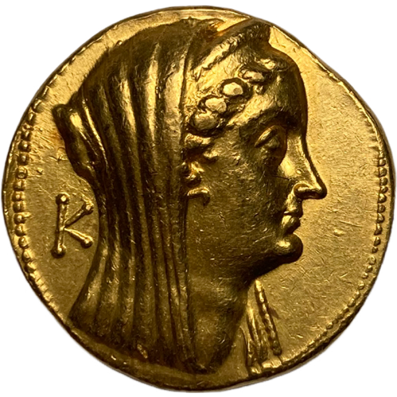 Pièce d'or représentant le profil d'une femme voilée, portant un diadème ; lettre K sur le côté.