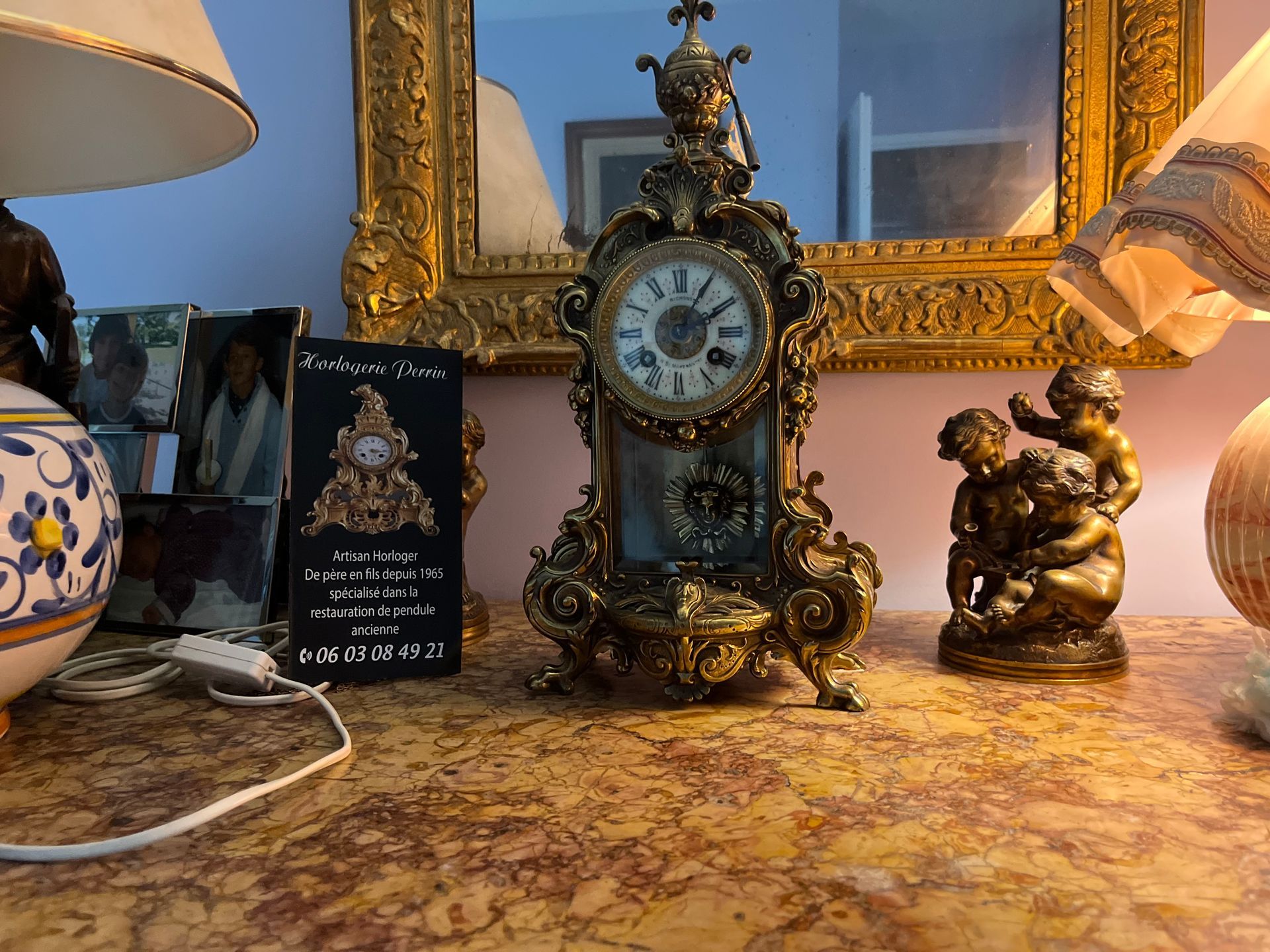 Horloge bronze et dorée.