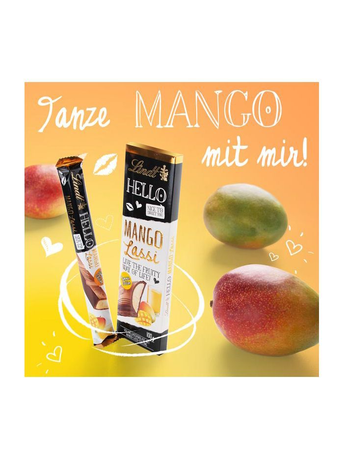 Content für Social Media - Ein Schokoriegel mit Mangogeschmack ist von Mangos umgeben.