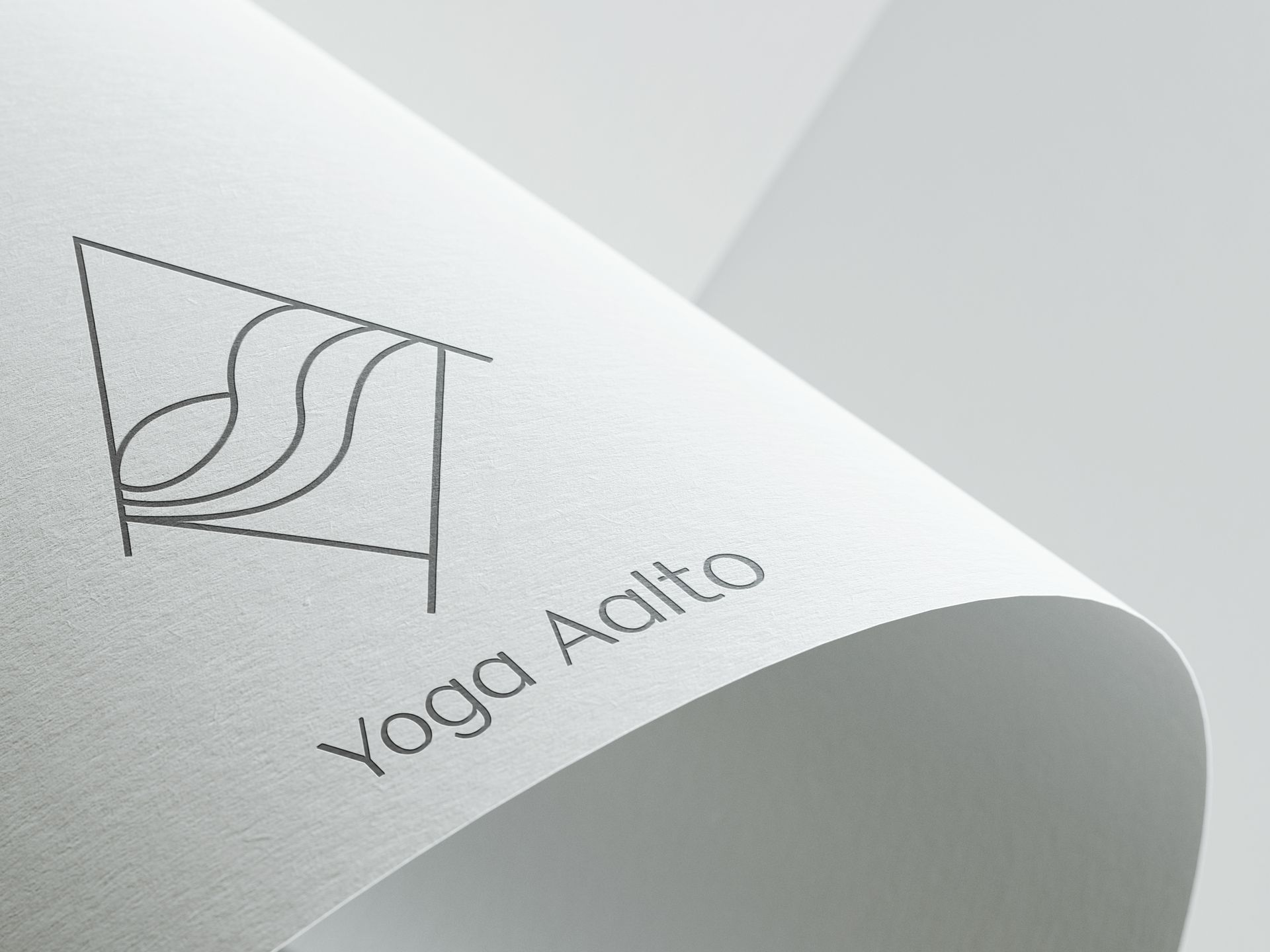 Eine Nahaufnahme eines Yoga-Aalto-Logos auf einem Stück Papier