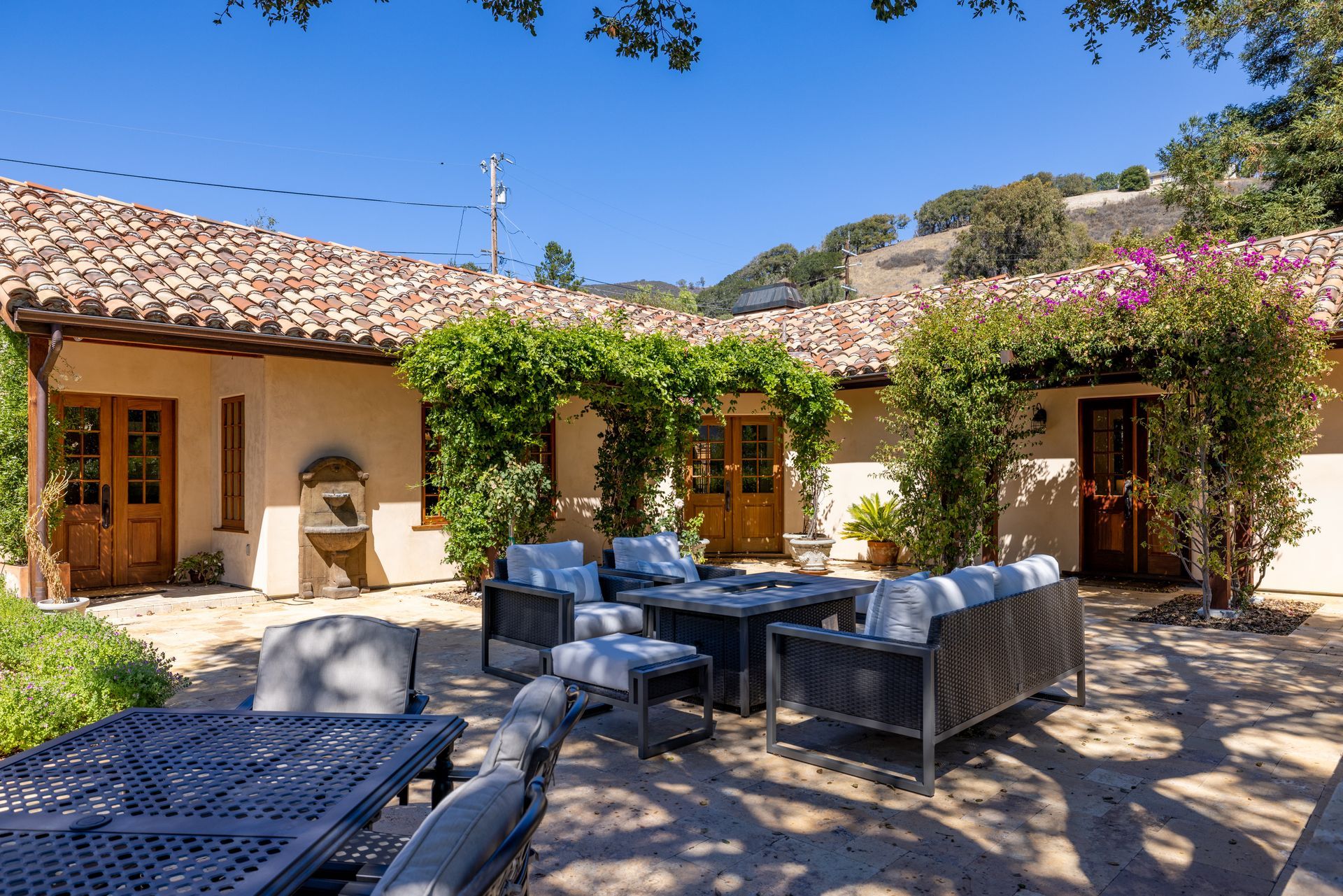 An aerial view of a house with a tiled roof