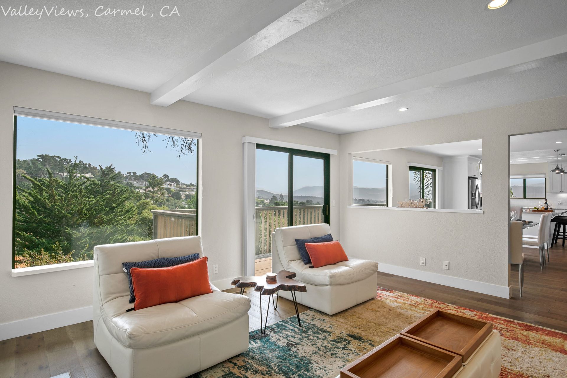 A living room with two chairs and a coffee table