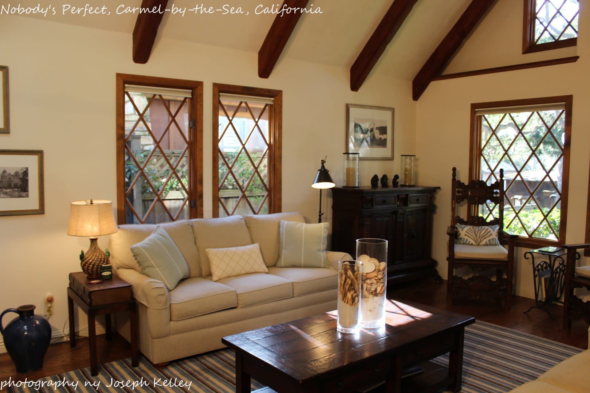 A living room with a couch and a coffee table