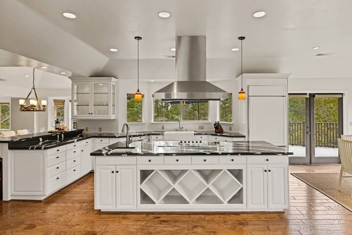 A large house with a lot of windows and a balcony