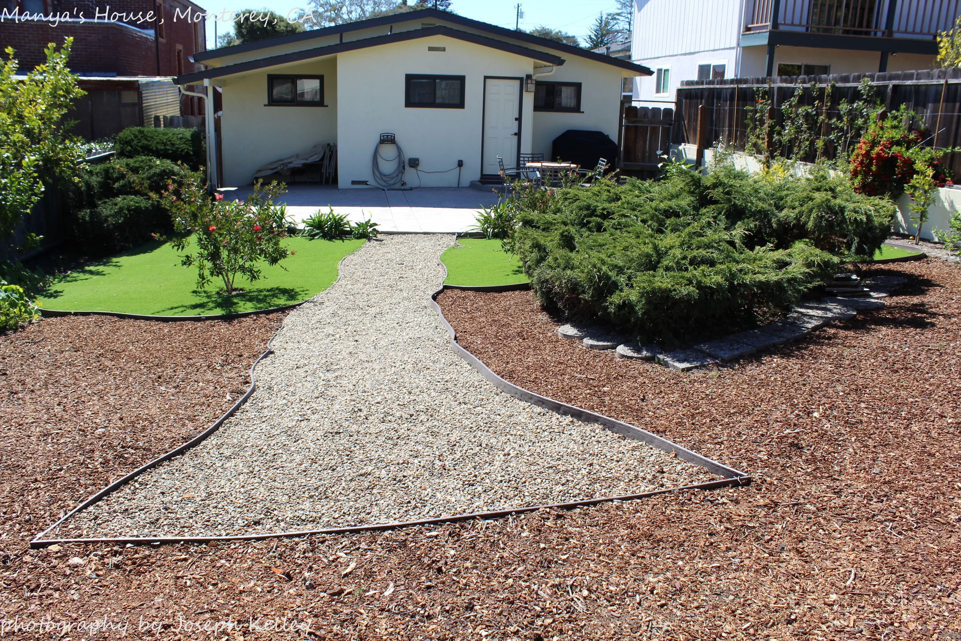 A house with a gravel path leading to it