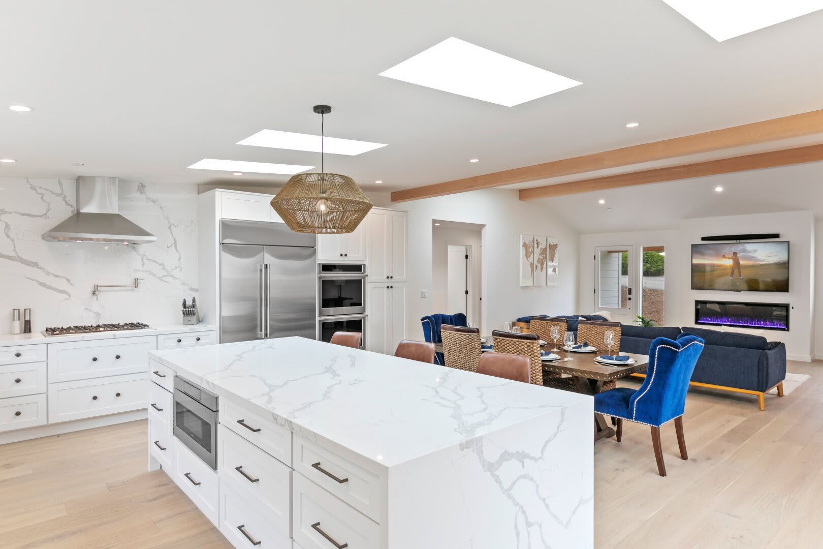 There is a large island in the middle of the kitchen.