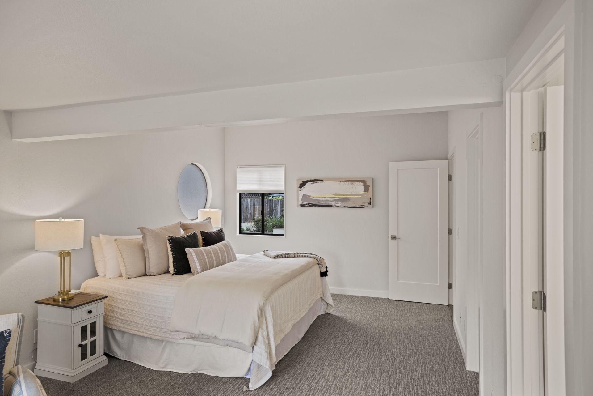 There is a large bed in the middle of the room.