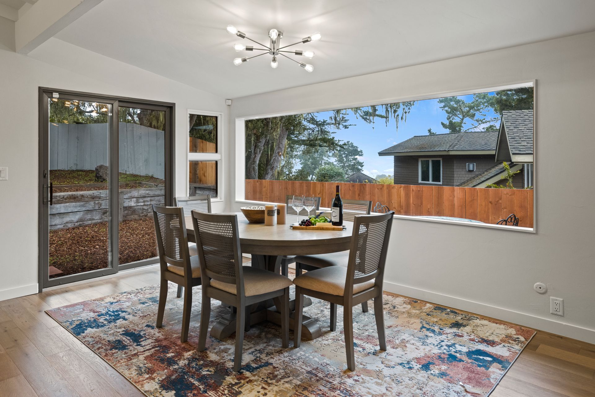 A small house with a mailbox in front of it