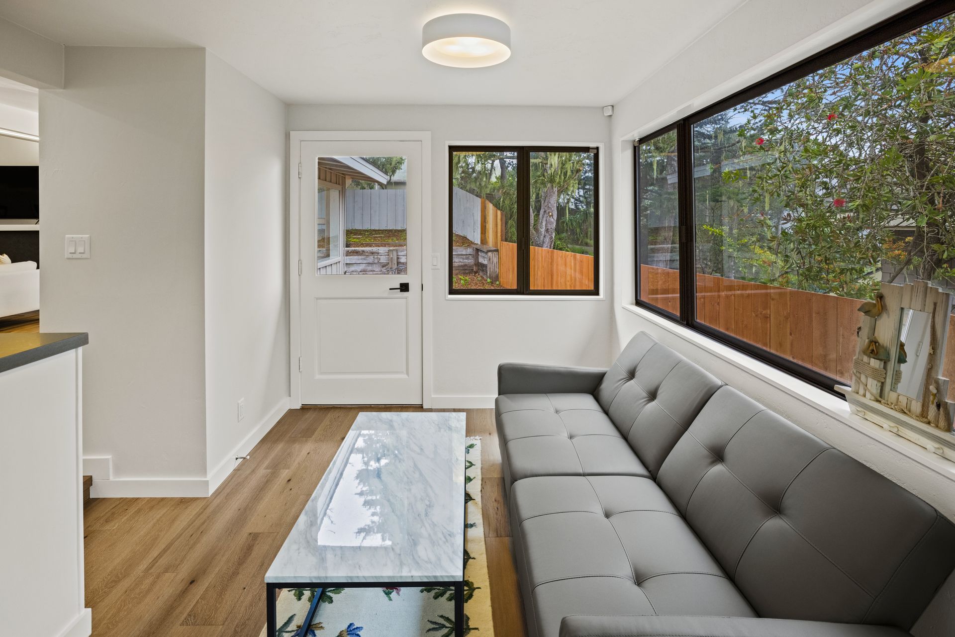 A living room with a couch and a coffee table