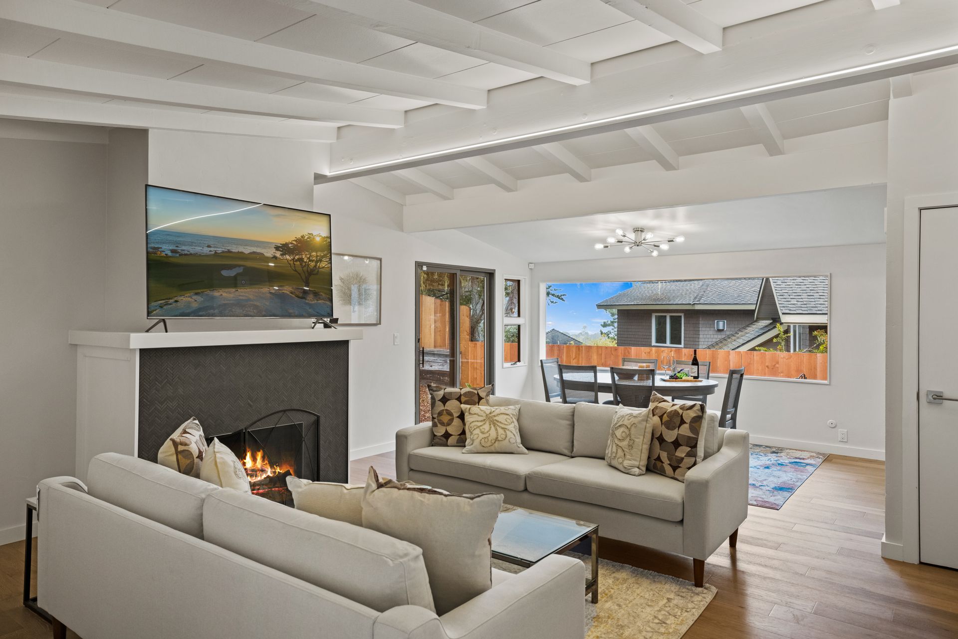 A living room with a fireplace and a couch