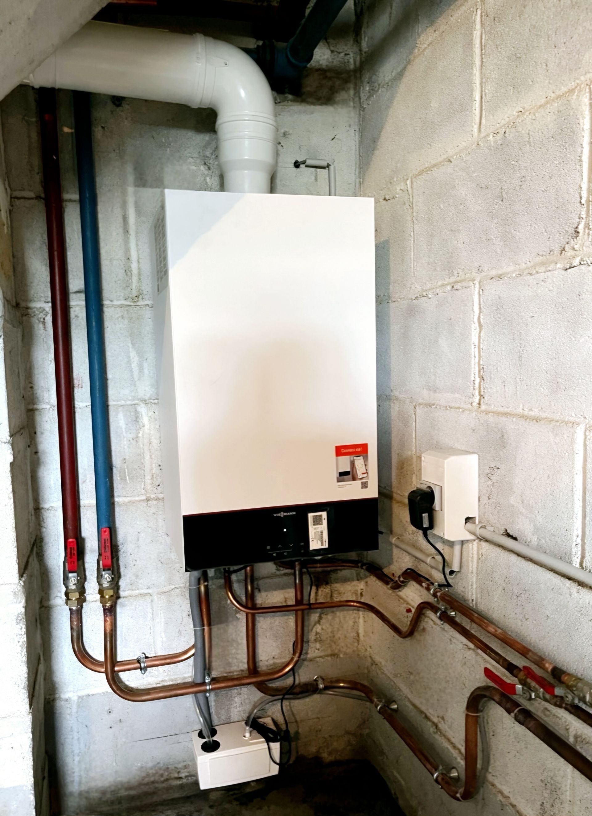 Photo d'un système de chauffage avec une chaudière à gaz