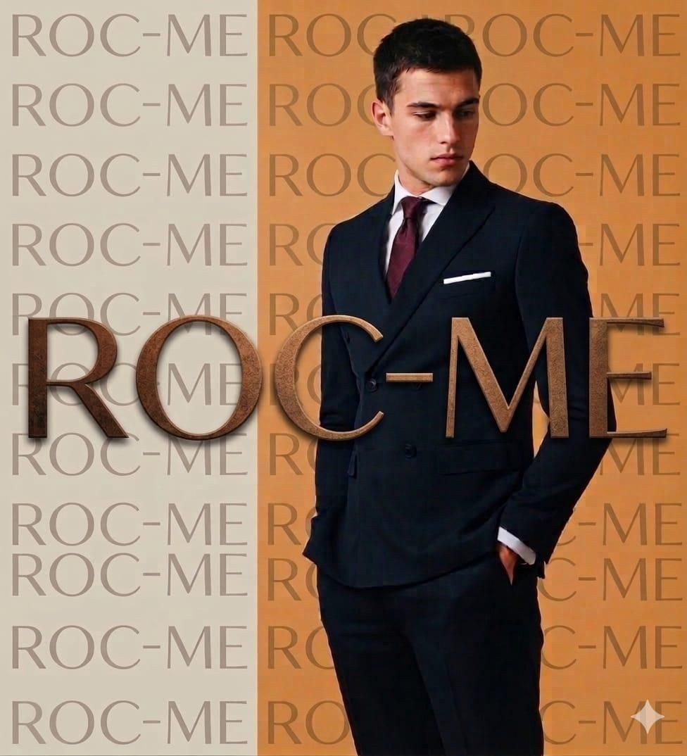 Una persona con traje oscuro y corbata granate 