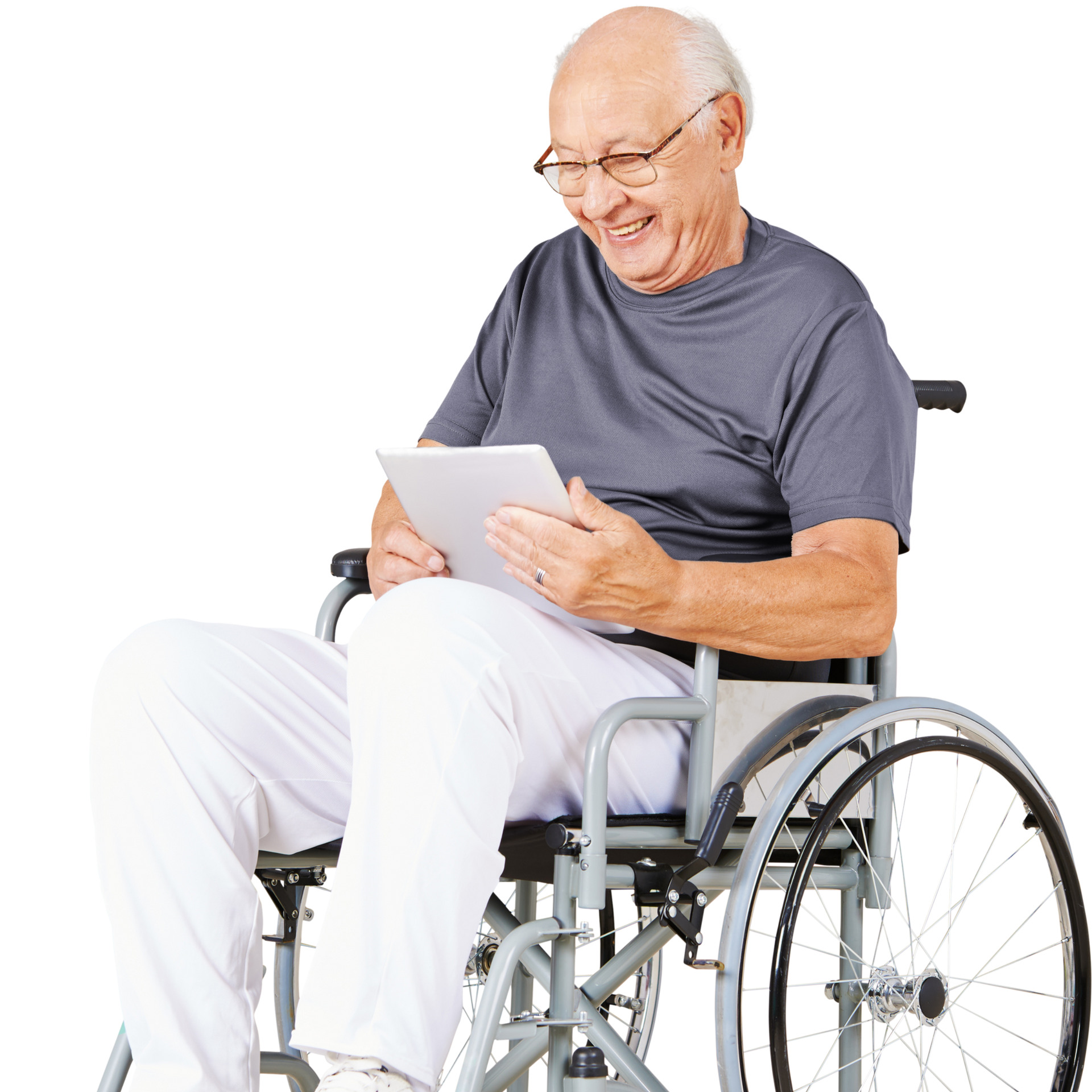 Un homme âgé assis dans un fauteuil roulant regardant sa tablette 