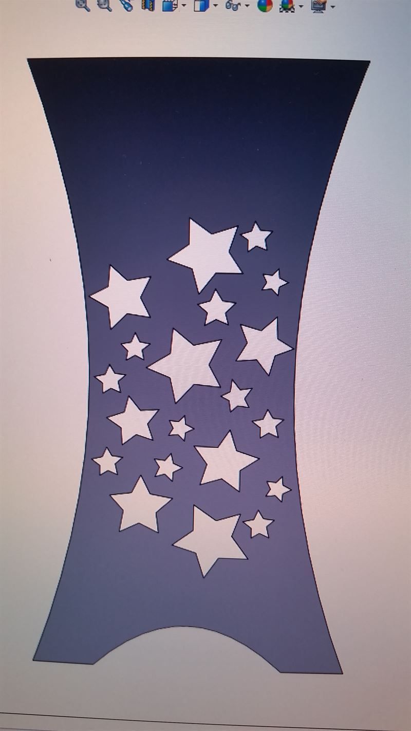 Ein Bild einer Vase mit Sternen darauf