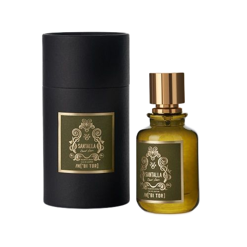 Frasco de perfume en frasco de vidrio teñido de oro con caja cilíndrica negra; etiqueta con diseño botánico.
