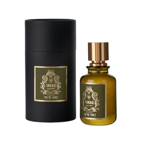 Frasco de perfume y caja cilíndrica a juego, ambos con etiquetas verdes sobre fondo negro. Detalles dorados.