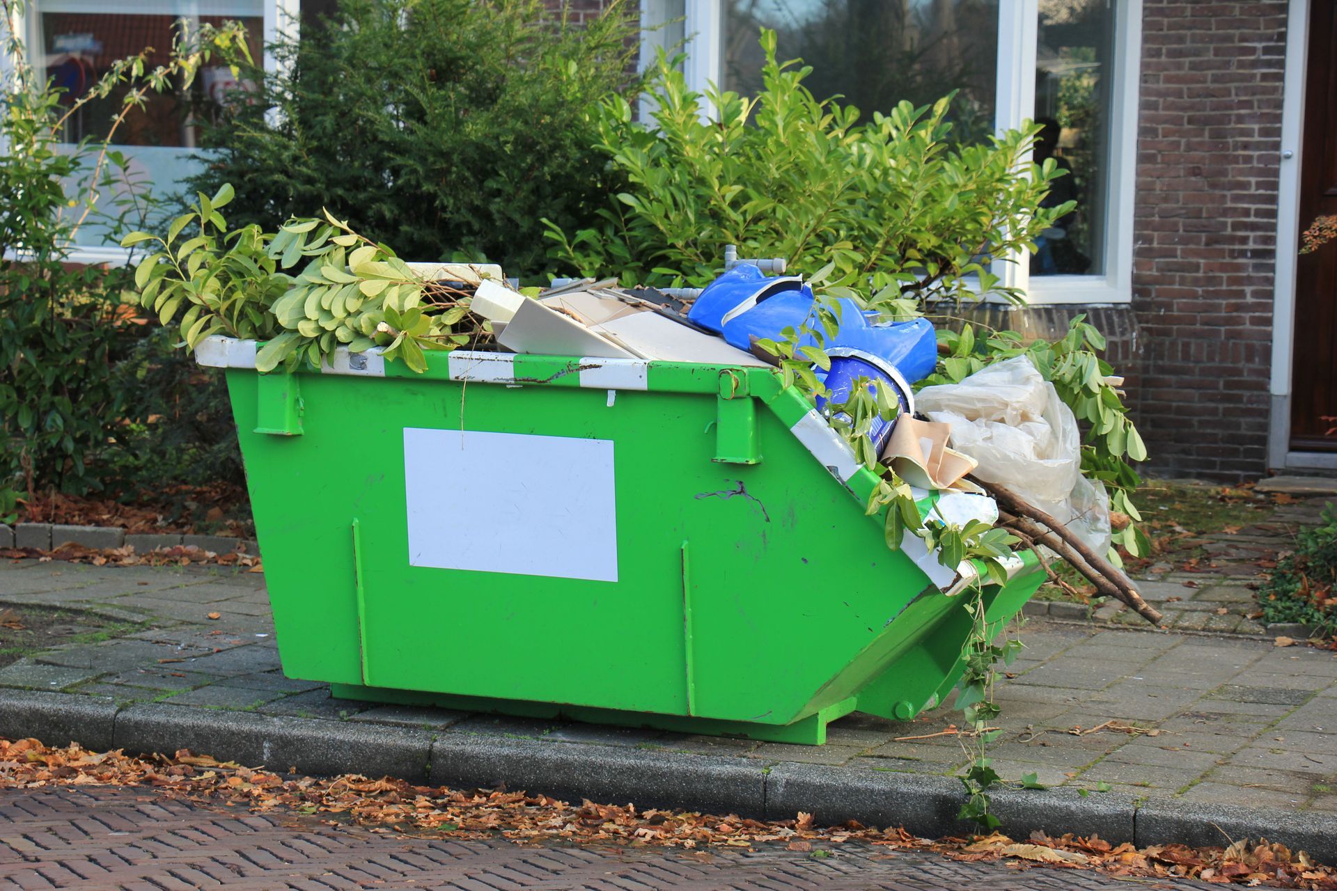 Benne à déchets verts.