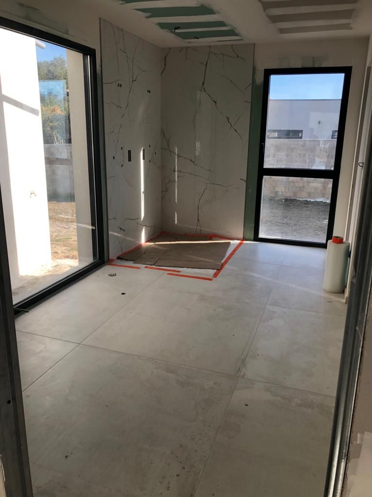 Carrelage imitation parquet dans une buanderie