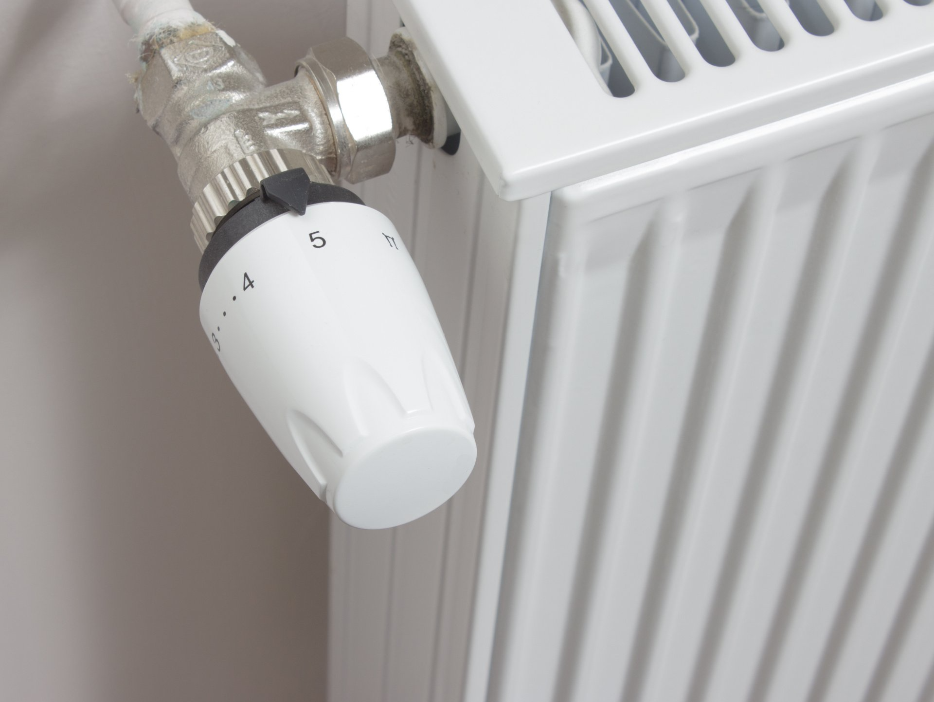 Poignet pour régler la température d'un chauffage