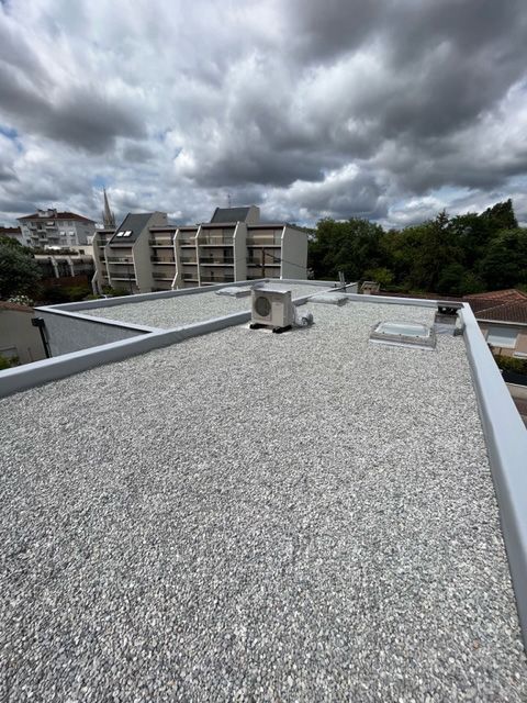 Toit plat avec gravier