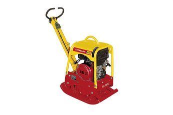 Eine rot-gelbe Maschine mit einem Griff auf weißem Hintergrund.