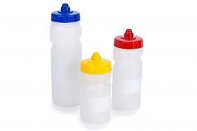 Three plastic bottles with different colored lids on a white background.
