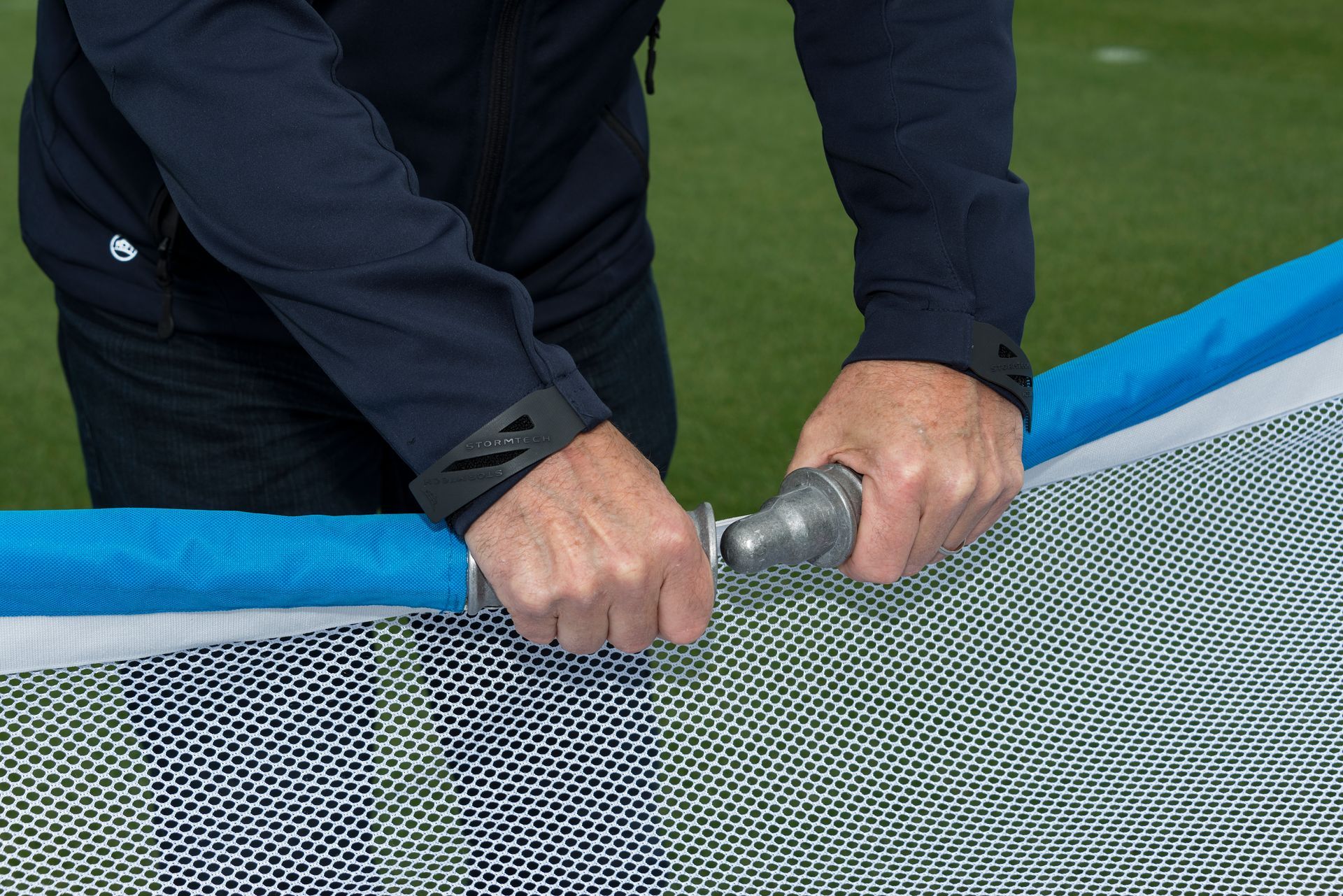 A blue and white soccer goal on a field