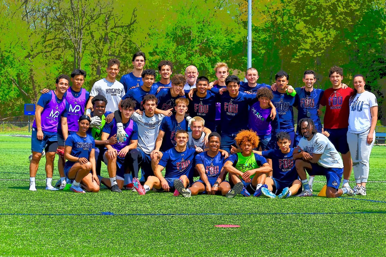 A group of young men are posing for a picture on a field