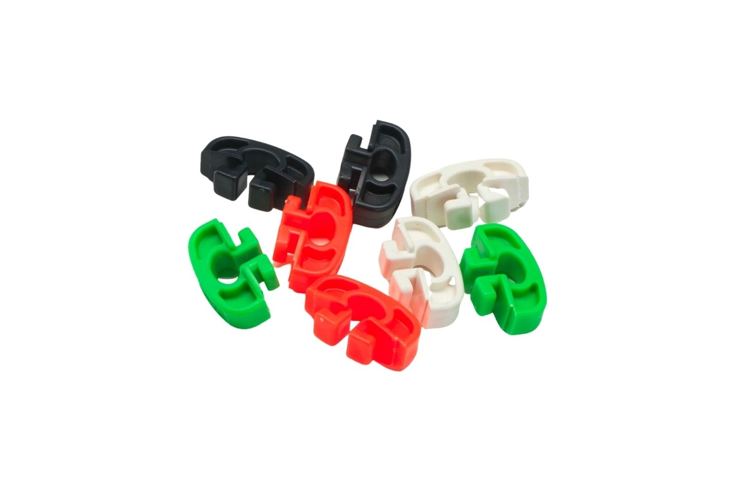 A close up of a ring holder with three different colored rings on it